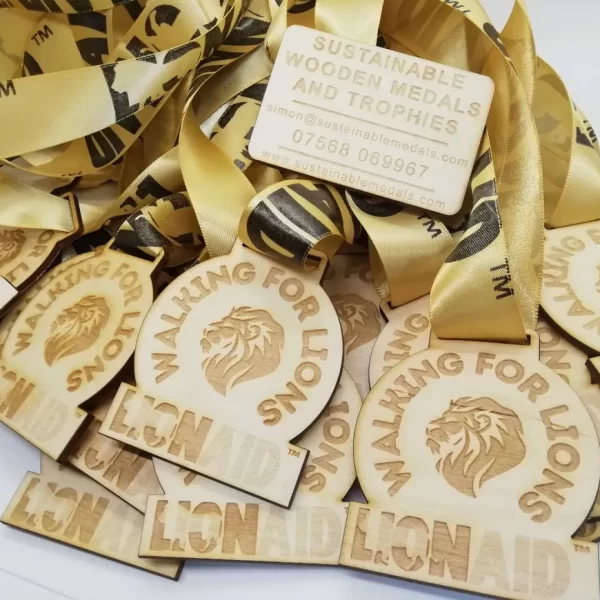 A group of running medals with the words walking for lions.