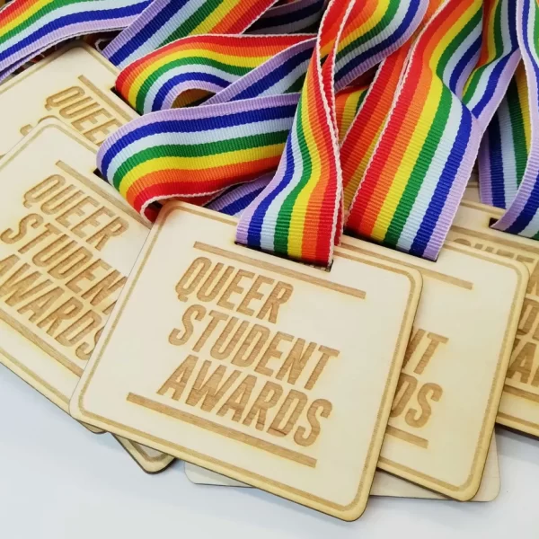 Celebrate outstanding LGBT students with special wooden medals.