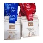 A set of eco friendly wooden lanyards for a 10k race.