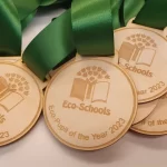 Eco schools day of the year medals.