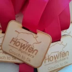 Howwinn runner's coach to ski medals.