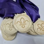 Scout medals with purple ribbons.