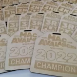 A group of wooden tags with the words mac avalanche 2020.