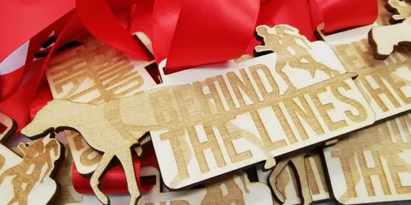 WOODEN MEDAL SUPPLIER: Offering a collection of premium wooden medals, each elegantly crafted with intricate designs etched delicately "behind the lines.