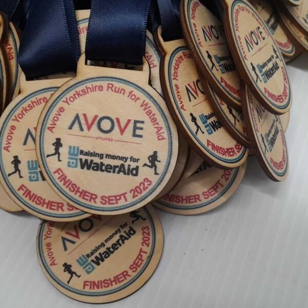 A group of medals with the word move on them.