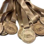 Custom wooden medal for scottish orienteering